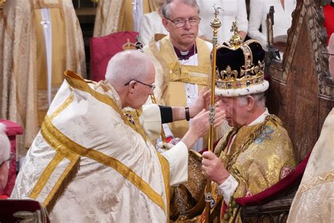 Archbishop of Canterbury crowns King Charles III, placing St. Edward’s Crown on monarch’s head
